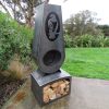 Kereru corten outdoor fireplace brazier in chiminea shape with wood storage made with New Zealand steel - side
