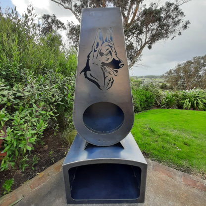 Dog corten outdoor fireplace brazier in chiminea shape with wood storage made with New Zealand steel - overall